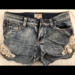 Women’s jean shorts with lace detail. Size 26